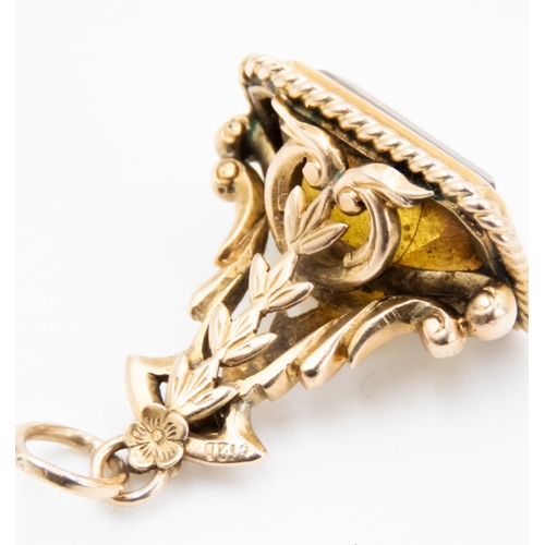 33 - Citrine Set Fob Pendant Mounted in 9 Carat Yellow Gold Attractively Detailed Floral Motifs 3cm High