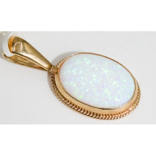 330 - Large Opal Pendant Mounted in 9 Carat Yellow Gold Rope Motif Edge 4.5cm High