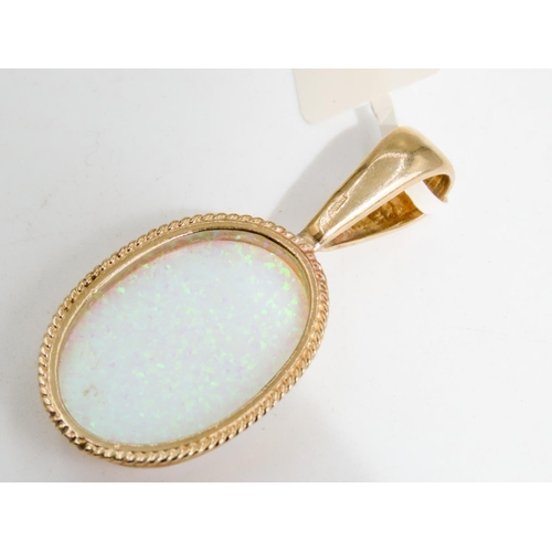 330 - Large Opal Pendant Mounted in 9 Carat Yellow Gold Rope Motif Edge 4.5cm High