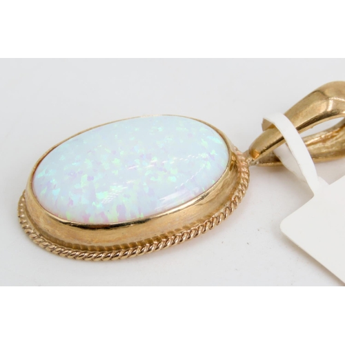 330 - Large Opal Pendant Mounted in 9 Carat Yellow Gold Rope Motif Edge 4.5cm High