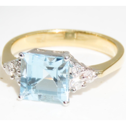 334 - Square Cut Aquamarine Centre Stone Ring  Basket set in 18 Carat Yellow Gold Further Diamond Clusters... 