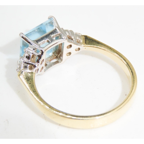 334 - Square Cut Aquamarine Centre Stone Ring  Basket set in 18 Carat Yellow Gold Further Diamond Clusters... 