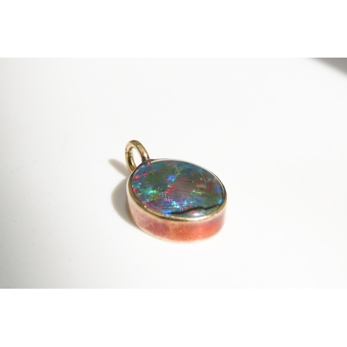 338 - Bezel Set Opal Pendant Mounted in 9 Carat Yellow Gold 1.5cm High