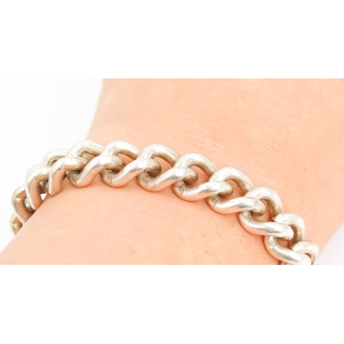 340 - Silver curb Link Bracelet 18.5cm Long Heart Form Clasp