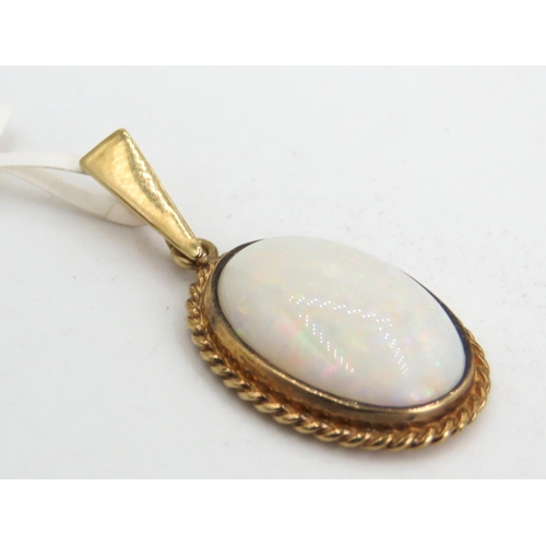 344 - Bezel Set Opal Pendant Mounted in 9 Carat Yellow Gold Rope Motif Surround 2cm High