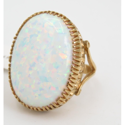 345 - Finely Detailed Basket Set Opal Single Stone Ring Mounted in 9 Carat Yellow Gold Ring Size P