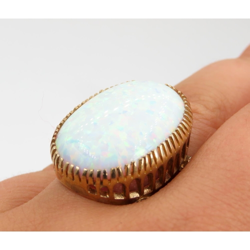 345 - Finely Detailed Basket Set Opal Single Stone Ring Mounted in 9 Carat Yellow Gold Ring Size P