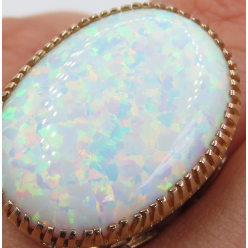 345 - Finely Detailed Basket Set Opal Single Stone Ring Mounted in 9 Carat Yellow Gold Ring Size P