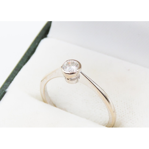 361 - BOODLES Bezel Set Diamond Solitaire Ring Mounted in 18 Carat White Gold Ring Size O and a Half 0.24C... 