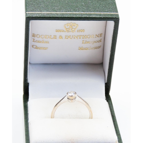 361 - BOODLES Bezel Set Diamond Solitaire Ring Mounted in 18 Carat White Gold Ring Size O and a Half 0.24C... 