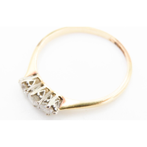 372 - Basket Set Diamond Three Stone Ring Mounted in 18 Carat Yellow Gold Ring Size N and a Half