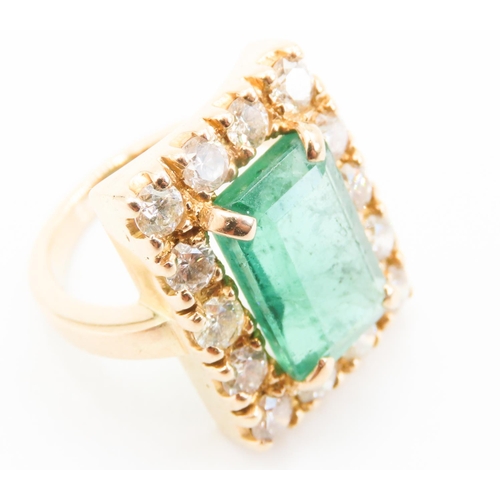 373 - Emerald and Fourteen Diamond Set Ladies Ring Mounted in 18 Carat Yellow Gold Total Emerald Carat Wei... 