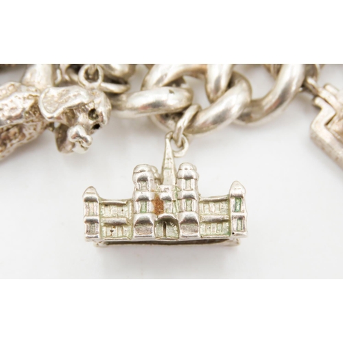 392 - Silver Multi Charm Bracelet of Good Weight 17.5cm Long