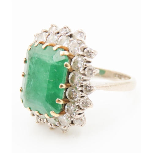 409 - Emerald Centre Stone Ring with Double Diamond Halo Mounted in 18 Carat White Gold Ring Size N