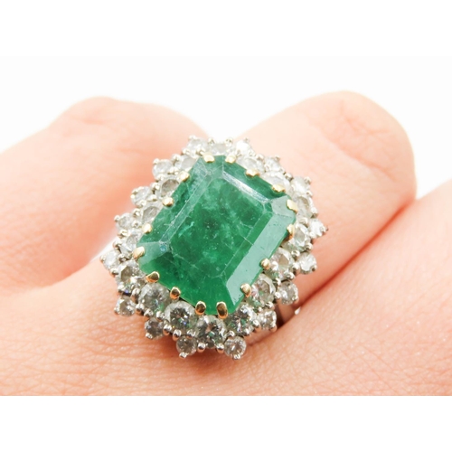 409 - Emerald Centre Stone Ring with Double Diamond Halo Mounted in 18 Carat White Gold Ring Size N