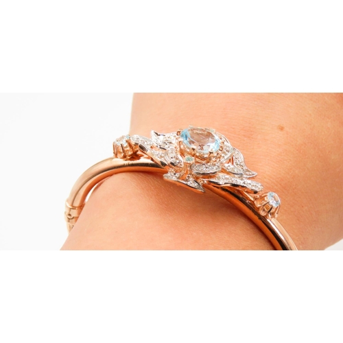 437 - 9 Carat Rose Gold Aquamarine Set Ladies Bangle Further Decorated with Diamonds Inner Width 6.5cm