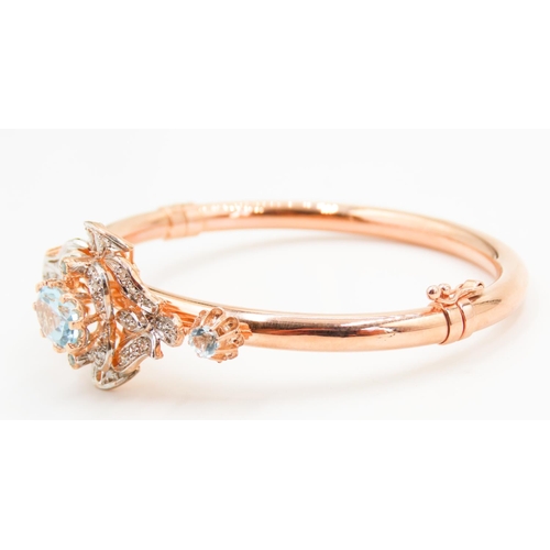 437 - 9 Carat Rose Gold Aquamarine Set Ladies Bangle Further Decorated with Diamonds Inner Width 6.5cm