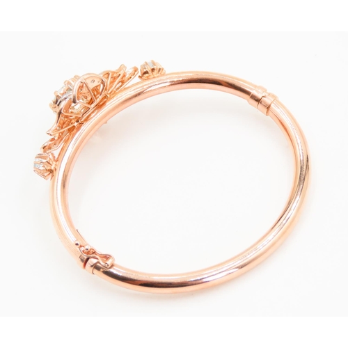 437 - 9 Carat Rose Gold Aquamarine Set Ladies Bangle Further Decorated with Diamonds Inner Width 6.5cm