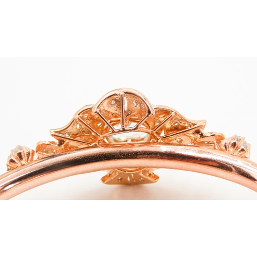 437 - 9 Carat Rose Gold Aquamarine Set Ladies Bangle Further Decorated with Diamonds Inner Width 6.5cm