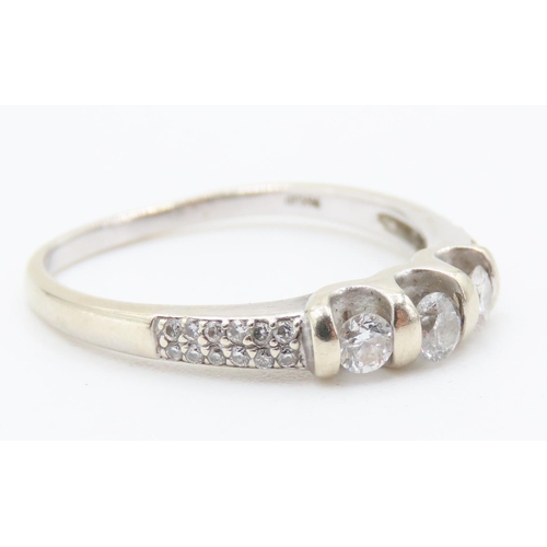 438 - Three Stone Diamond Set Ring Mounted in 14 Carat White Gold further Diamonds Set to Shoulders Ring S... 