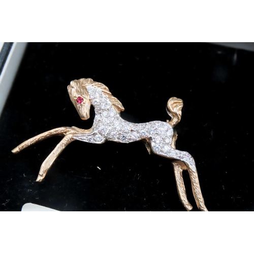 460 - Ruby and Gemstone Set 9 Carat Yellow Gold Horse Brooch 4cm Wide