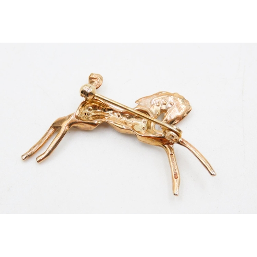 460 - Ruby and Gemstone Set 9 Carat Yellow Gold Horse Brooch 4cm Wide