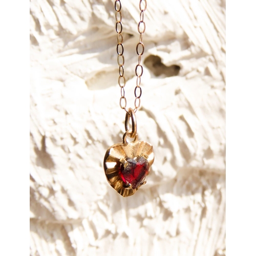 477 - Red Garnet Set Heart Form 9 Carat Yellow Gold Pendant 1cm High Set on 9 Carat Yellow Gold 41cm Long ... 