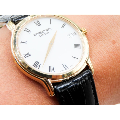 497 - Raymond Weil Geneve Swiss Made Gold Tone Wristwatch Roman Numeral Date Aperture Black Leather Strap ... 