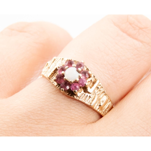 50 - Ruby and Opal Set Daisy Motif Ring Mounted in 9 Carat Yellow Gold Textured Band Ring Size P