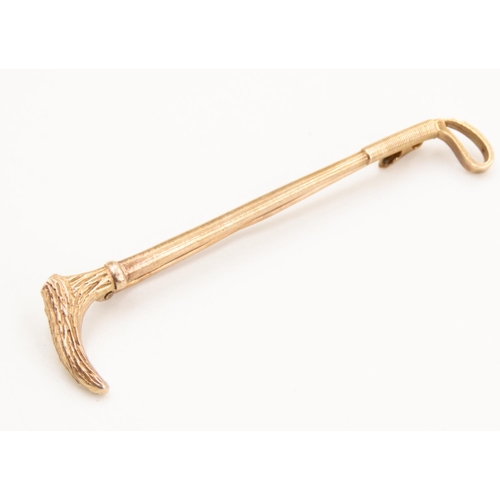 54 - Finely Detailed 9 Carat Yellow Gold Riding Crop Brooch 6cm Long