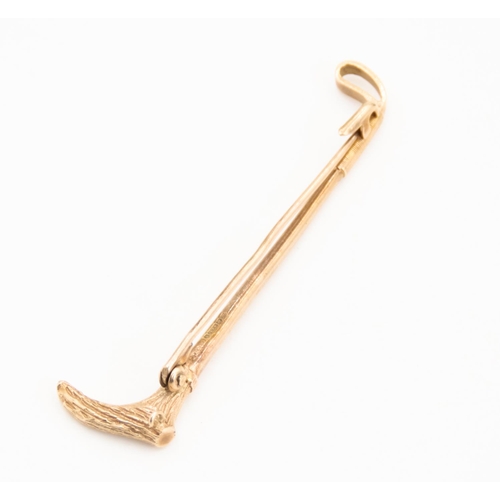 54 - Finely Detailed 9 Carat Yellow Gold Riding Crop Brooch 6cm Long