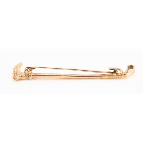 54 - Finely Detailed 9 Carat Yellow Gold Riding Crop Brooch 6cm Long