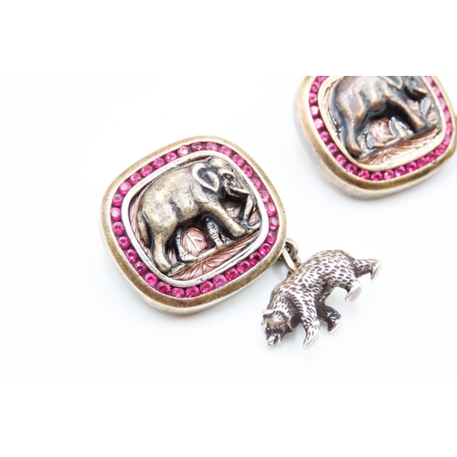 545 - Pair of Russian Silver Ruby Set Elephant and Bear Motif Cuff Links Signed Faberge