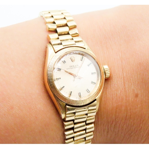 551 - 18 Carat Yellow Gold Rolex Oyster Perpetual Ladies Wristwatch