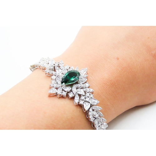 554 - Finely Detailed Pear Cut Tourmaline Principal Stone Diamond Cluster Set Bracelet Mounted in 18 Carat... 