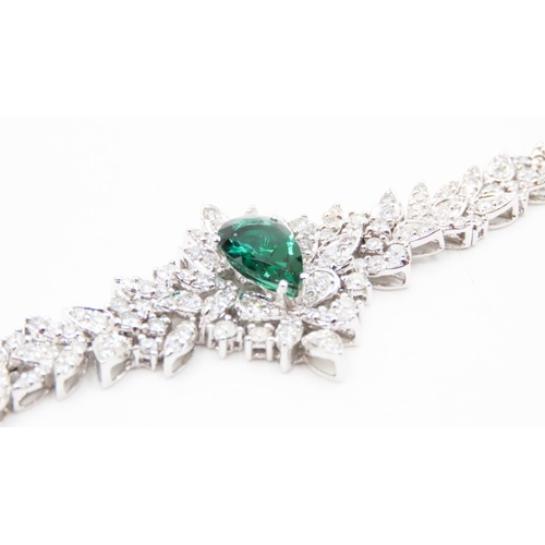 554 - Finely Detailed Pear Cut Tourmaline Principal Stone Diamond Cluster Set Bracelet Mounted in 18 Carat... 