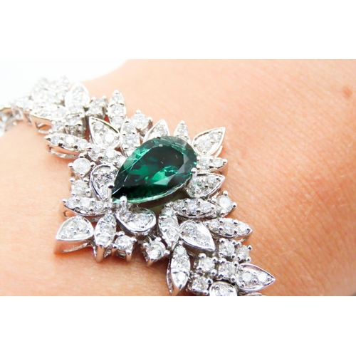 554 - Finely Detailed Pear Cut Tourmaline Principal Stone Diamond Cluster Set Bracelet Mounted in 18 Carat... 