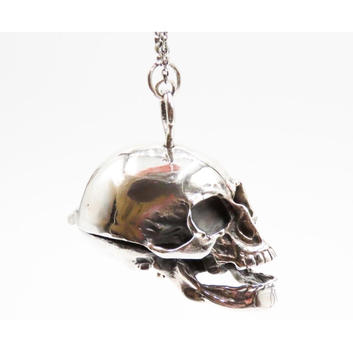 562 - Silver Skull Locket Chain Attractively Detailed with Further Skeleton Details Chain 27cm Long