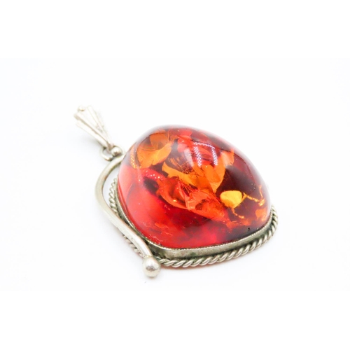 563 - Large Amber Pendant Set in Silver Rope Form Edge 4cm High