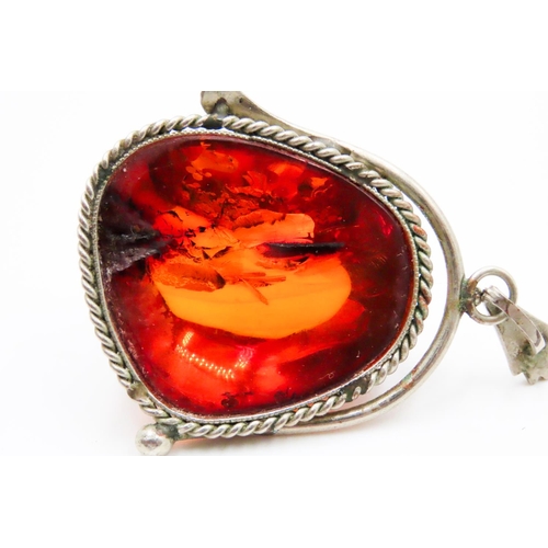 563 - Large Amber Pendant Set in Silver Rope Form Edge 4cm High