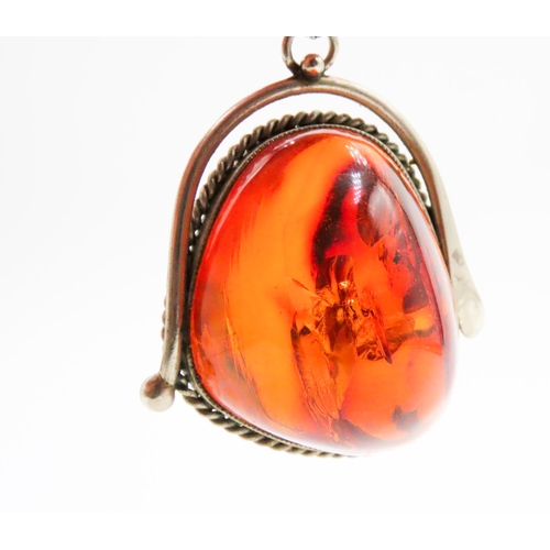 563 - Large Amber Pendant Set in Silver Rope Form Edge 4cm High