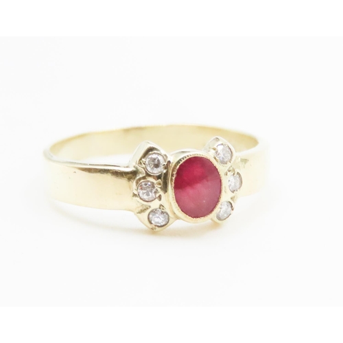 570 - Bezel Set Cabochon Cut Ruby Centre Stone Bow Form Ring Further Diamond Set to Shoulders Mounted in 1... 