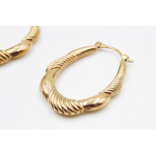 574 - Pair of 9 Carat Yellow Gold Twist Form Oval Hoop Earrings 3cm High