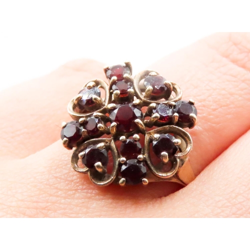 584 - Red Garnet Set Ladies Cluster Ring Heart Motifs Mounted in 9 Carat Yellow Gold Ring Size Q