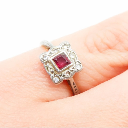 585 - Square Cut Ruby Set Ring Mounted in 18 Carat Yellow Gold Further Diamond Set Surround Ring Size J