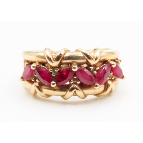 597 - Six Stone Ruby Ring with Further Diamond Inset Finely Detailed Set in 14 Carat Yellow Gold Ring Size... 