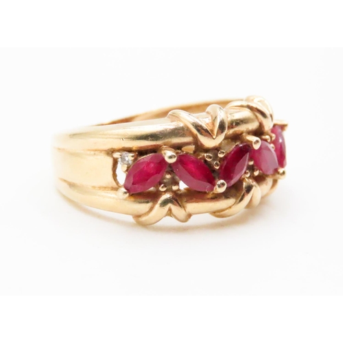 597 - Six Stone Ruby Ring with Further Diamond Inset Finely Detailed Set in 14 Carat Yellow Gold Ring Size... 