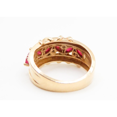 597 - Six Stone Ruby Ring with Further Diamond Inset Finely Detailed Set in 14 Carat Yellow Gold Ring Size... 