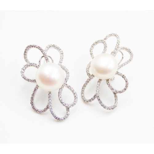 601 - Unusual Form Pearl and Diamond Set Petal Form Earrings Mounted in 14 Carat White Gold 3.5cm High