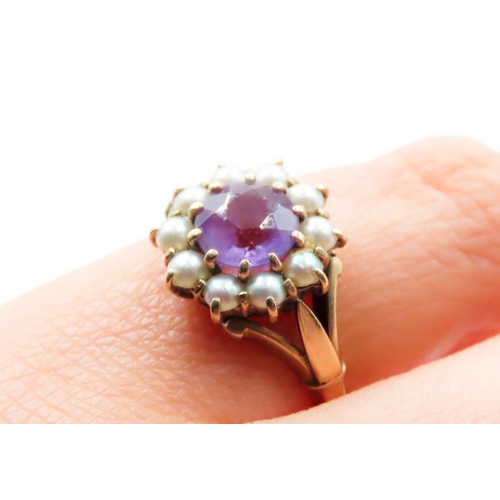 604 - Amethyst and Seed Pearl Daisy Form Ring Mounted in 9 Carat Yellow Gold Ring Size J and a Half